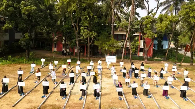 Children collect safe water at a CBB hand-pump