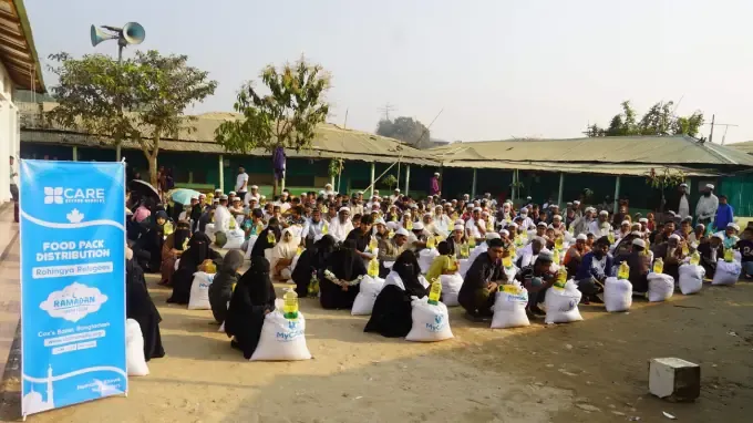 Families gather to receive CBB Ramadan food packs