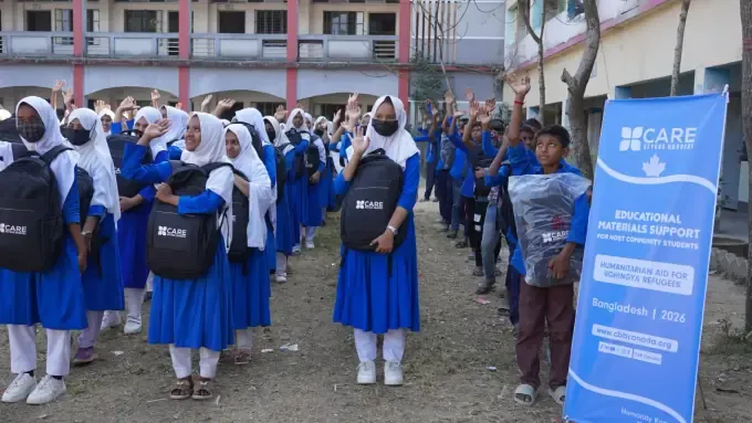 Girls in uniform with new schoolbooks
