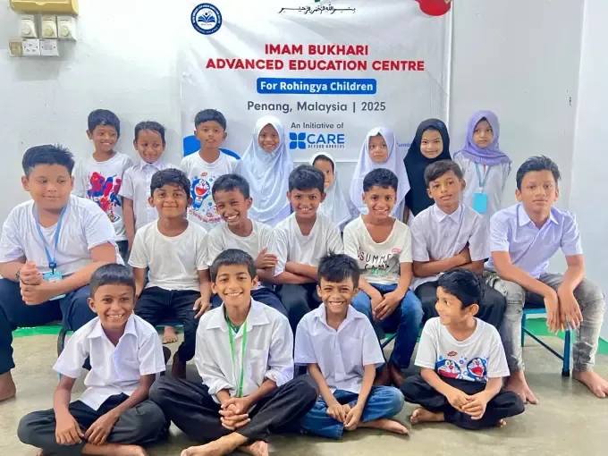 Students raise their hands at a CBB education centre