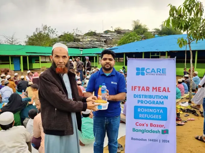 CBB volunteers run an iftar distribution in the field